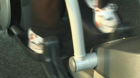 Feet walk on crosstrainer Stock Footage 544544
