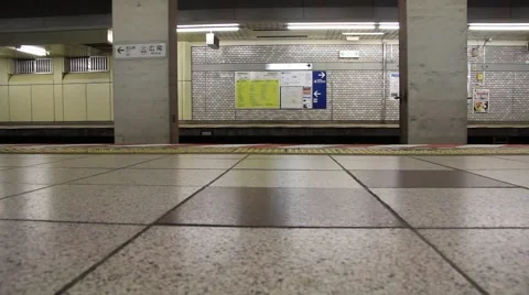 Feet walking across train platform low shot Video stock 58960793