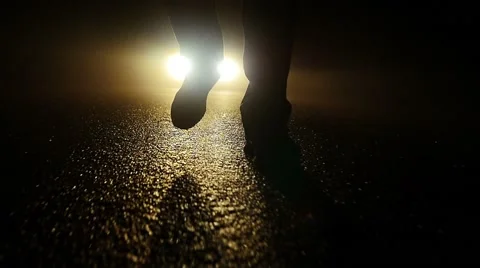 Feet walking into dark night. criminal crime scene. spooky mystic mood Stock Footage
