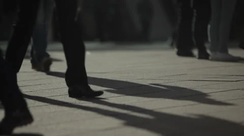 Feet walking with shadows Stock Footage 36563897