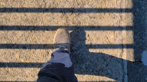 A feet walking on the side of the Kurobe Dam in Japan Stock Footage 130156291