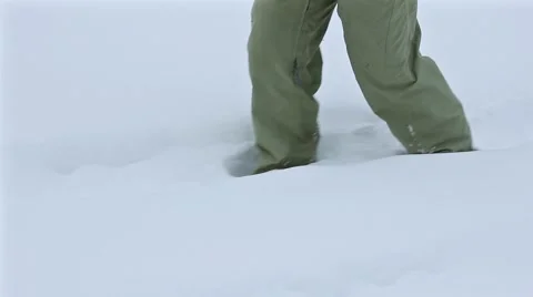 Feet walking on snow, closeup, side view Video stock 45864658