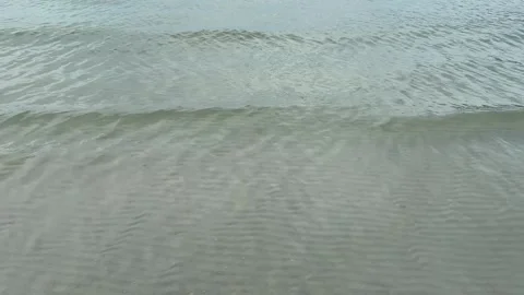 Feet Walking in the Water of Sandy Beach in Sihanoukville Video stock 337082764