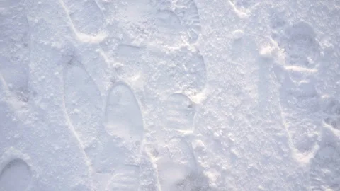 Feet in winter boots on snow visible from above. Stock Footage 246442452