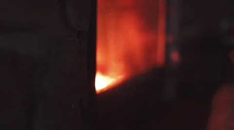Feet in woollen socks by Burning Christmas Fireplace. 4K STABILIZED shot. Stock Footage