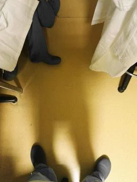 Feet at work Stock Photos