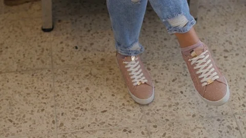 Feets of Client sitting in make up chair Stock Footage 75845626