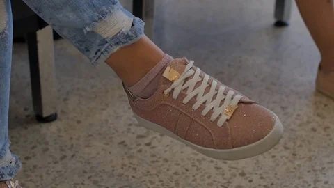 Feets of Client sitting in make up chair Stock Footage 75845961