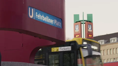 Fehrbelliner Platz Berlin - U Bahn - Subway Sign and bus passes by Stock Footage 166090958