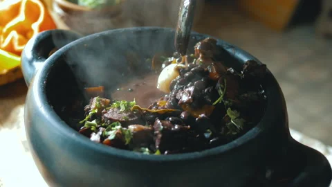 Feijoada, a typical Brazilian dish Stock Footage 163944640