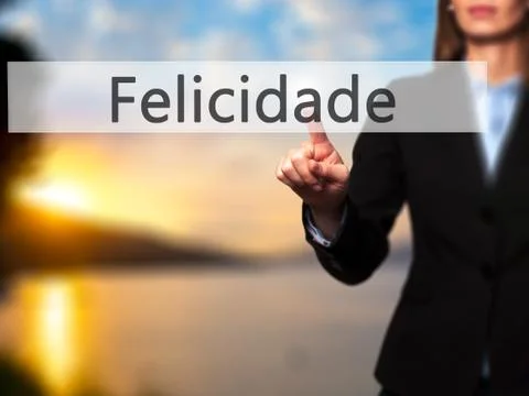 Felicidade (Happiness in Portuguese) - Businesswoman hand pressing button on  Stock Photos