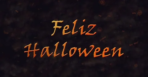 Feliz Halloween text in Spanish dissolving into dust to bottom Stock Footage 68687915
