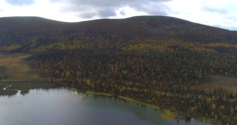 Fells in Lapland, Aerial, reverse, drone shot, over lake Pallasjarvi, overloo Stock Footage 118714050