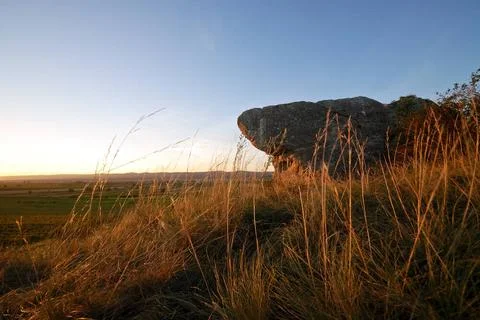 Felsen auf einem Hügel Boulder on a hill with lovely grass Copyright: xZoo.. Stock Photos