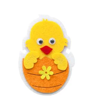 Felt chicken hatched from an Easter egg Stock Photos