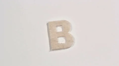 Felt letter “B” on white background. Defocus Stock Footage 60250434