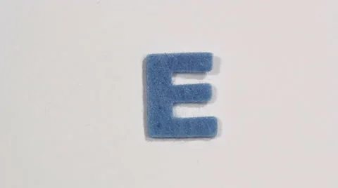 Felt letter “E” on white background.... | Stock Video | Pond5