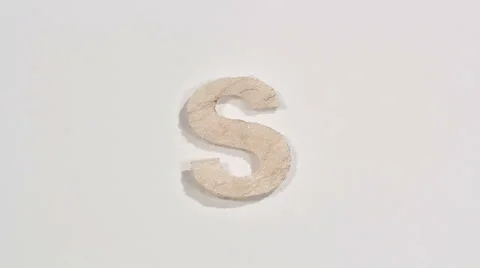 Felt letter “S” on white background. Defocus Stock Footage 60251871