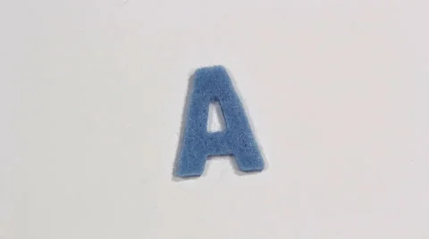 Felt letter “A” on white background. Defocus Stock Footage 60250450