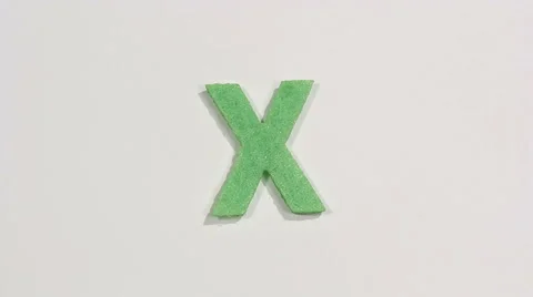Felt letter “X” on white background. Defocus Stock Footage 60252745