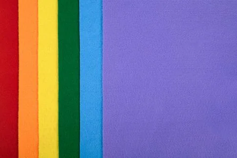 Felt samples in rainbow colors in a vertical arrangement. Stock Photos