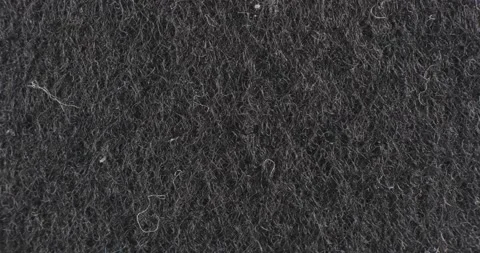 Felt texture close-up. Black background. Macro tissue. Stockbeeldmateriaal 165650199