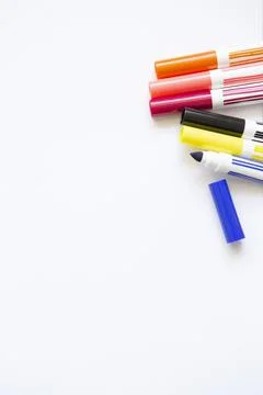 Felt-tip pens of different colors on white background Stock Photos