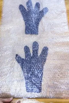 Felted gloves packed in mat for rolling Stock Photos