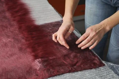 Felting wool by hand. Stock Photos