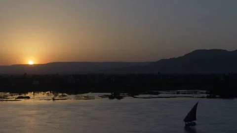 Feluka on Nile river during sunset Video stock 244678909