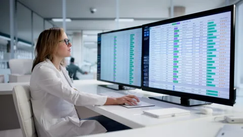 Female Accountant Using Computer For Medical Billing Stock Footage 328396184