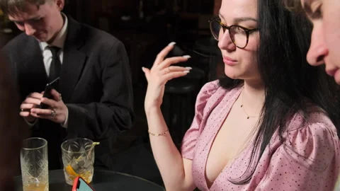 Female actively gestures explaining information to man Stock Footage 266826564