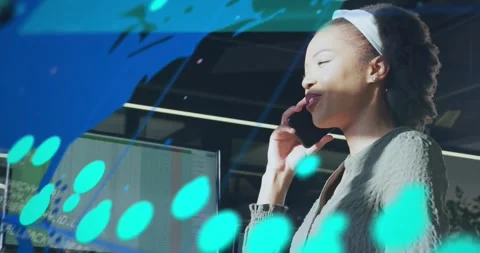 Female analyst on phone discussing data in office, cue causing finance layers Stock Footage 328345471