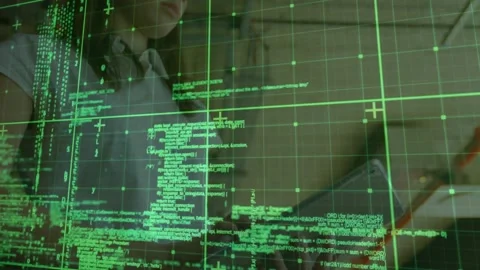 Female analyst using tablet, causing green grid overlay to show reflection while Stock Footage 330509058