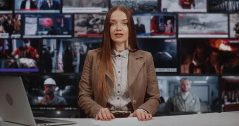 Female Anchor Hosts Prime Time News in High Tech Studio Equipped With Large Stock Footage 332569944