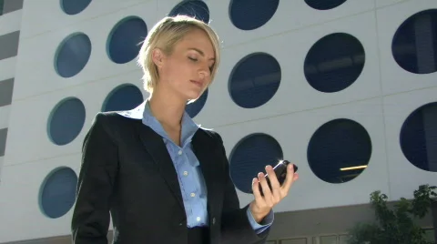Female answering phone call Stock Footage