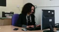 Female answers work phone HD Footage