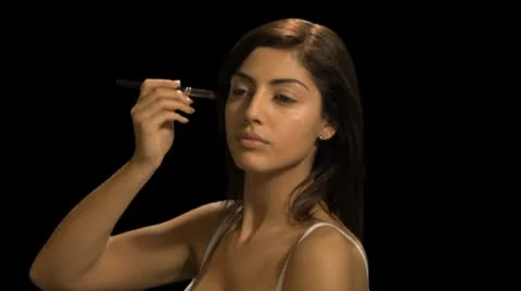 Female applying make up Stock Footage 8948308