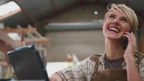 Female Apprentice Carpenter With Digital Tablet Working In Furniture Workshop Video stock 242296495