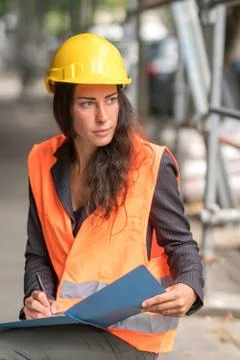 Female apprentice construction worker Stock Photos