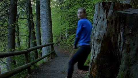 Female archer hunting in the forest Video stock 80487220