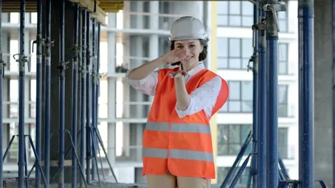 Female architect having fun dancing at construction siteof an under-construction Stock Footage 162068806