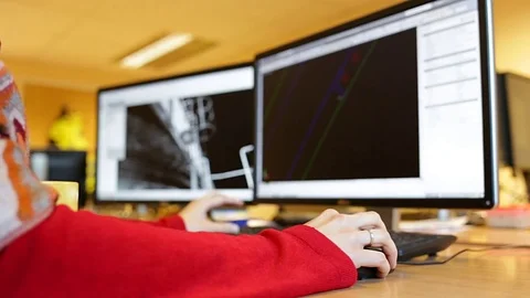 Female architect or engineer designing building Stock Footage 70108737