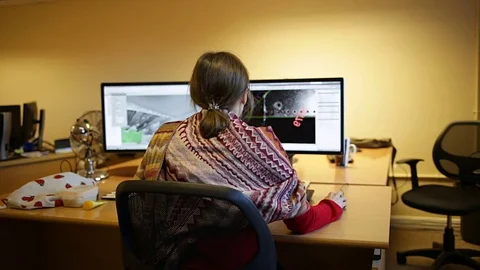 Female architect or engineer drawing building in 3d software Stock Footage 70113537