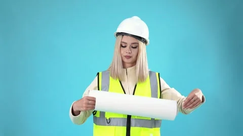 Female Architect Rolling Up Blueprint and Walking Away Against Blue Backgroun Stock Footage 346111304