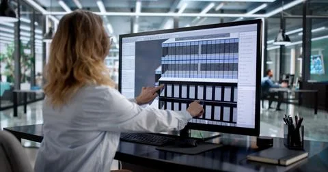 Female Architect Using 3D BIM Technology For Building Design Stock Photos