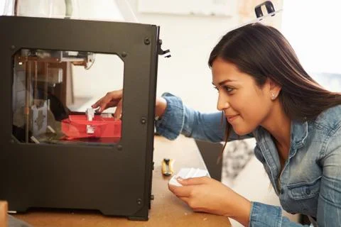 Female architect using 3d printer in office Stock Photos