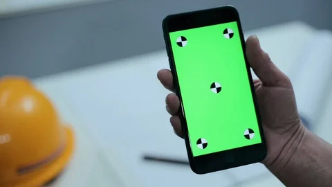 Female Architect Using Mobile Phone - Smartphone With Chroma Key Green Screen Stock Footage 129777724