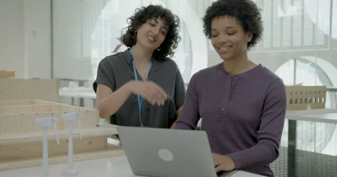 Female Architects in Office Working on Computer Technology, Developing Wind Stock Footage 291889703