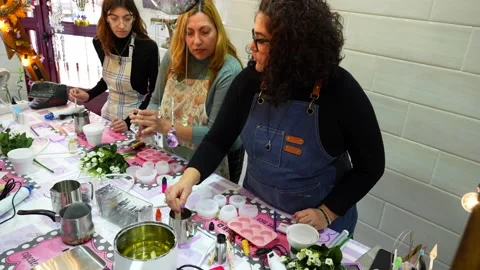 Female artisan teaching a candle making workshop Stock Footage 334555127
